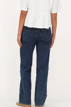 Donkerblauwe Jeans Met Studs Aan De Zijkant