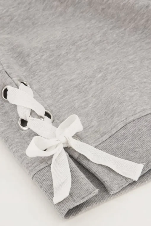 Grijze Sweater Met Witte Strikjes