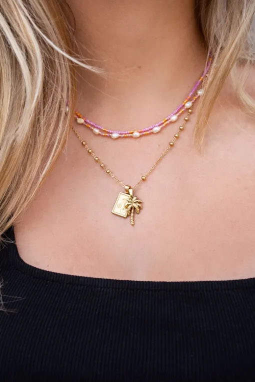 Souvenir Oranje & Roze Kettingen Set Met Kralen En Parels