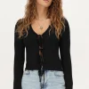 Zwart Vestje Met Lurex & Strikjes