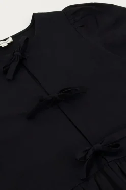 Zwarte Top Met Strikjes En Pofmouwen