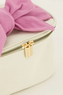 Beige Toilettas Met Roze Strik